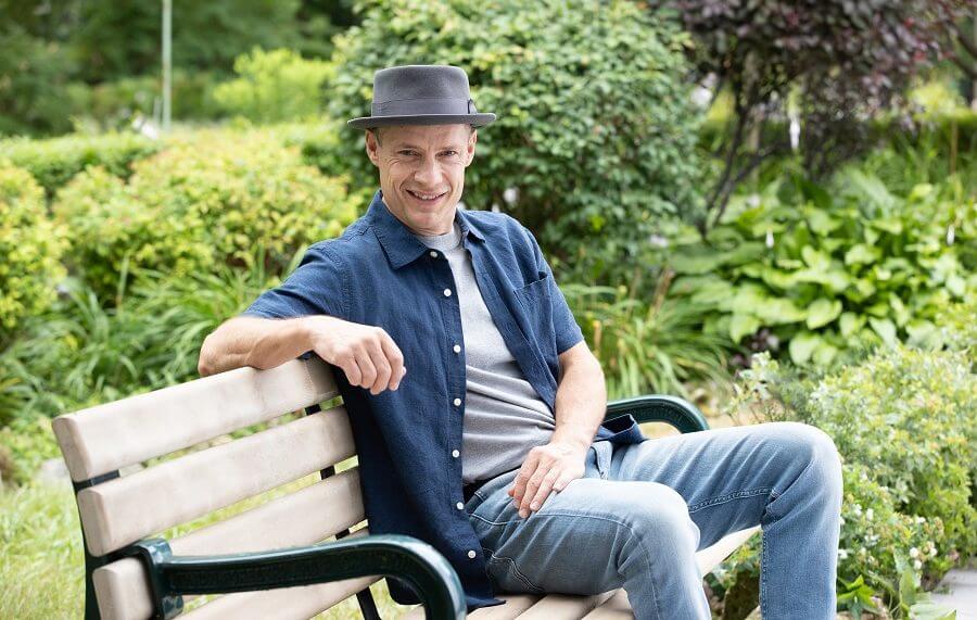 Kurt Browning sitting on a bench