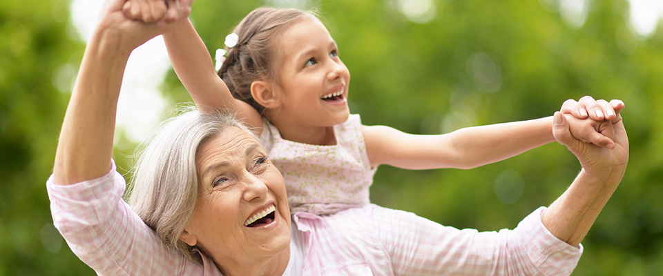 Canadian Senior enjoying with grandchildren.